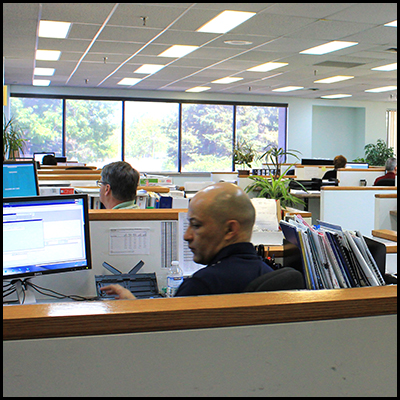 Back of man sitting at desk